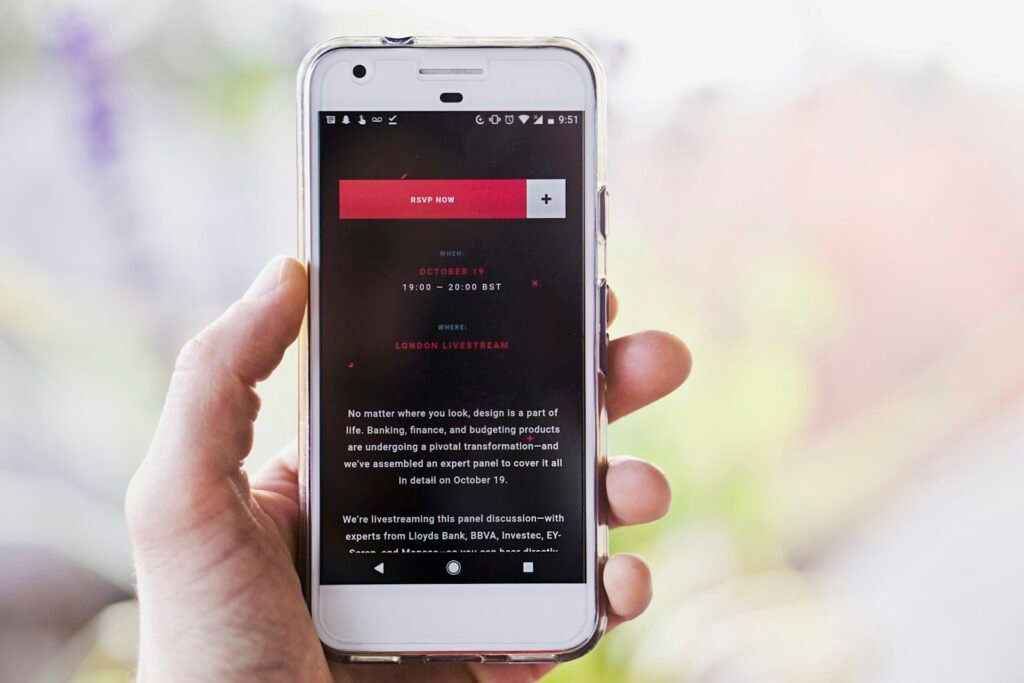 Person doing outreach and email work on a phone, photo by Matthew Fournier on Unsplash