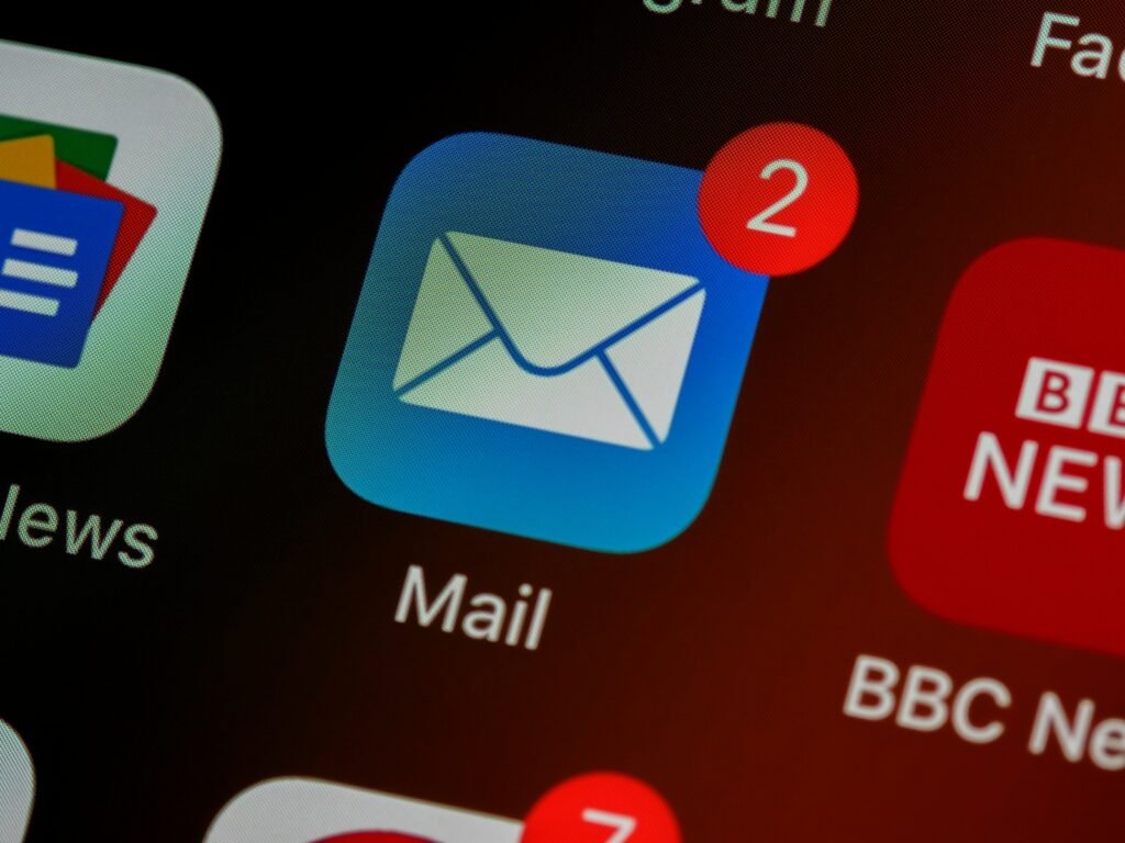 Mail app icon closeup, photo by Brett Jordan on Unsplash